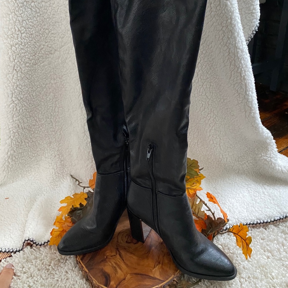 Thigh high leather boots